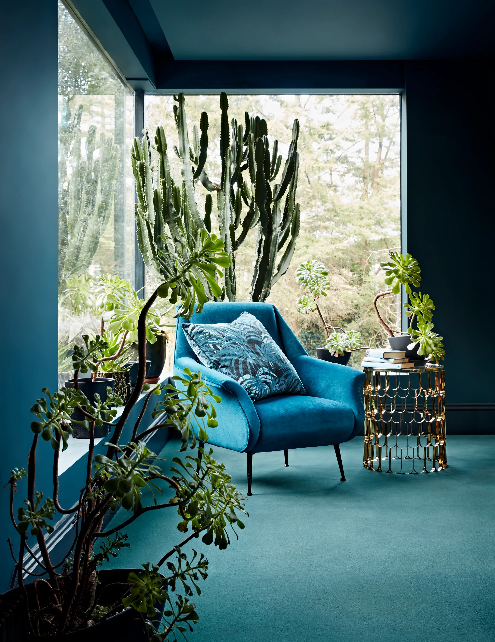 Brintons Velvet Collection Austen Teal carpet in a garden room