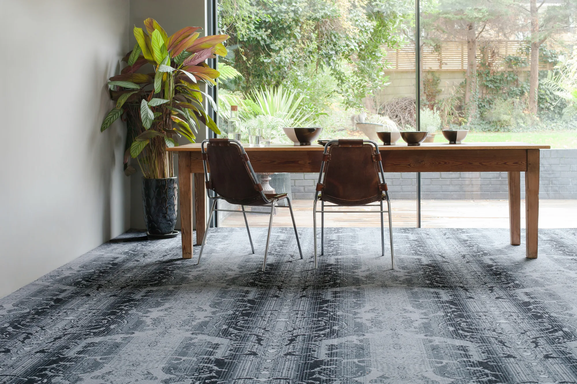 Brintons Timorous Beasties Jet Damask carpet in a dining room