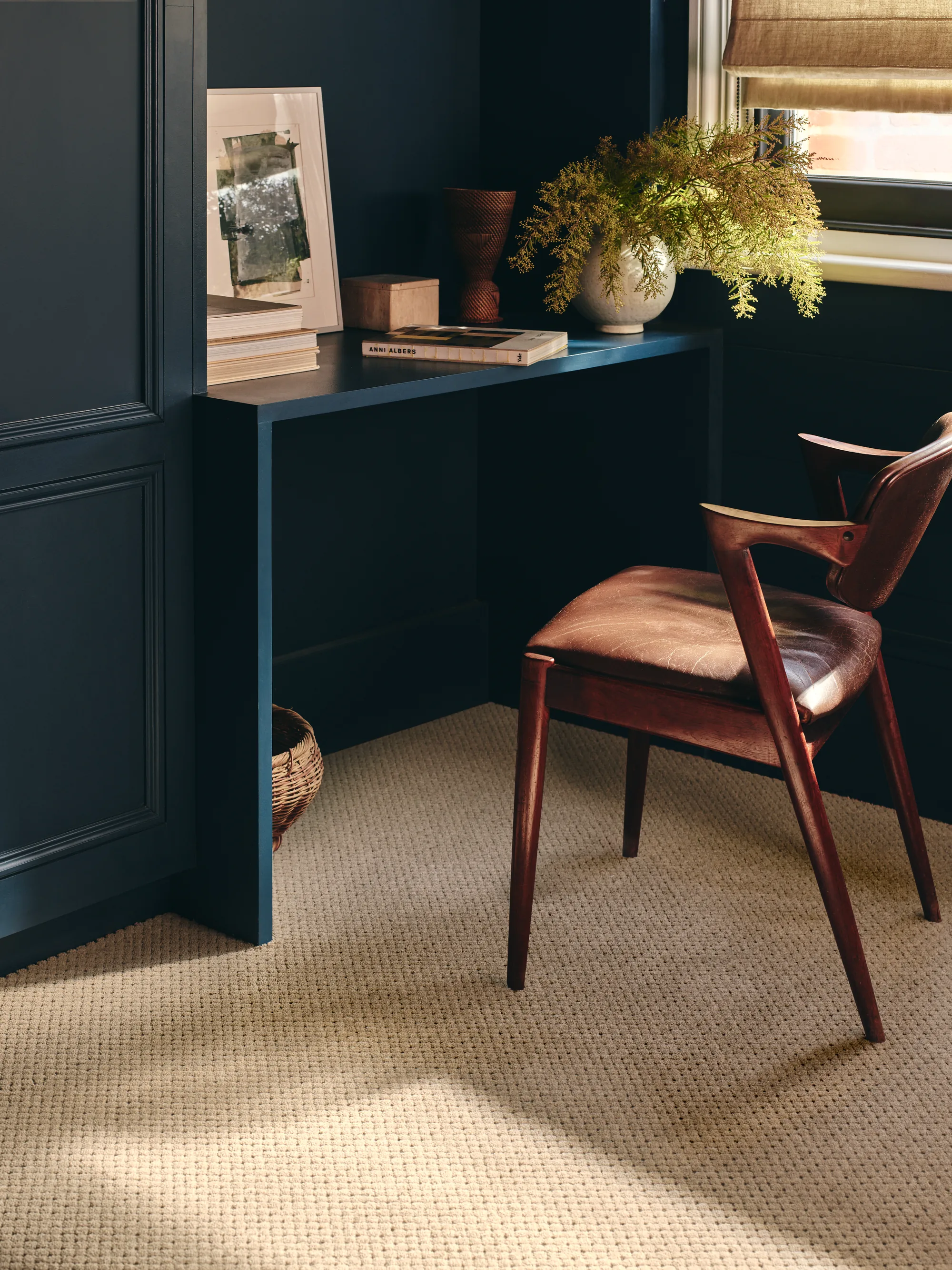 Brintons Country Life Dapple Bamboo carpet in a navy sitting room