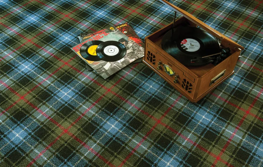 Ulster Glenmoy Robertson tartan carpet with a record player