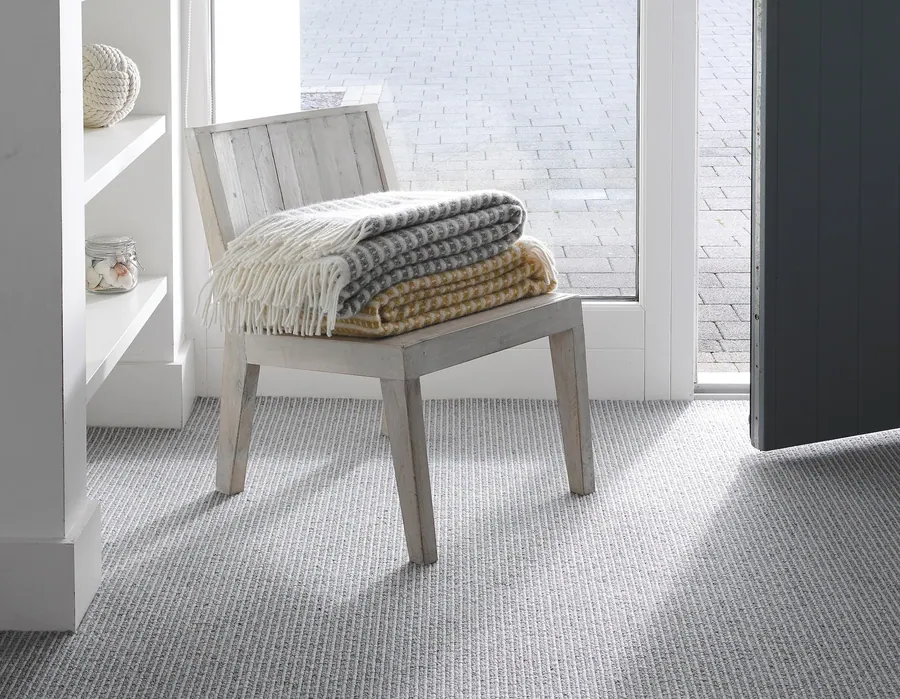 Ulster Habitus Strond Bay carpet in a window seat corner